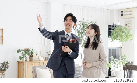 Businessman showing a room 115352958