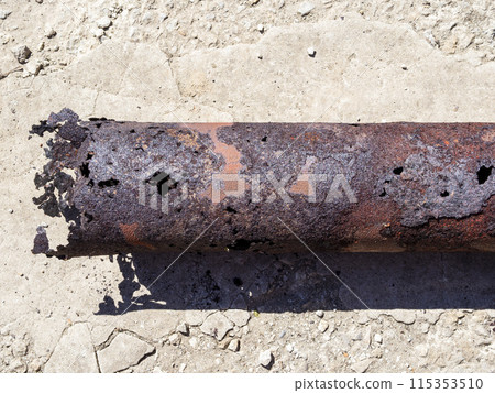 corroded edge of steel pipe with holes close up corroded edge of steel pipe with holes close up 115353510
