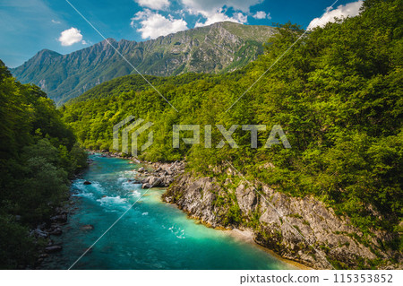 Soca river and high mountains in background, Kobarid, Slovenia 115353852