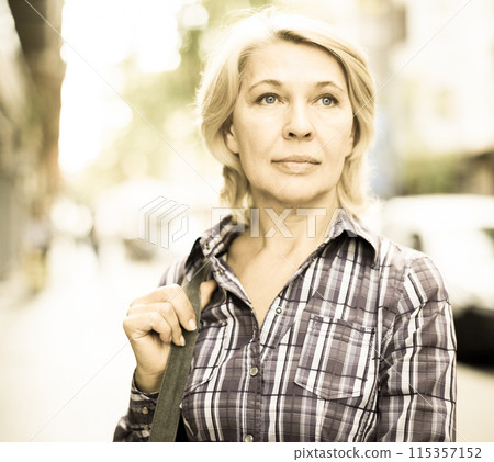 Portrait of elderly blonde woman Portrait of elderly blonde woman 115357152