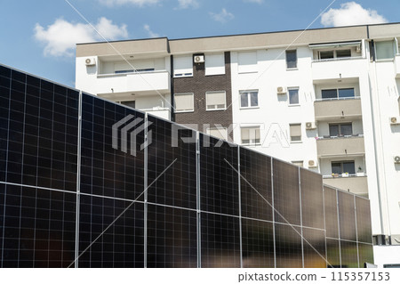 Solar panels near an apartment building Solar panels near an apartment building 115357153