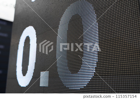 Close up of led panel with score 0 - 0. 115357154