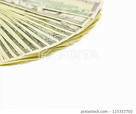 Cash US dollars on a white background. From top view. Cash money paper. 115357702