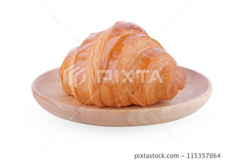 French Croissant on Wooden Plate Isolated on White Background French Croissant on Wooden Plate Isolated on White Background 115357864