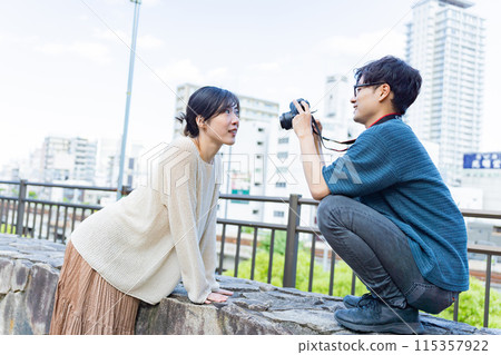Couple on a camera date Couple on a camera date 115357922