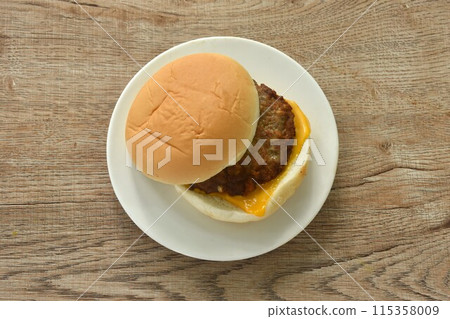 fried mashed beef cheese hamburge stuffed mayonnaise sauce with ketchup on plate   115358009