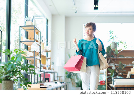 A young woman shopping A young woman shopping 115358103