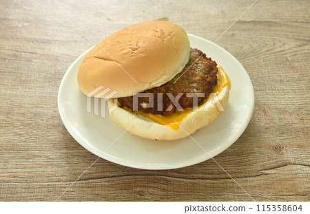 fried mashed beef cheese hamburger stuffed mayonnaise sauce with ketchup on plate fried mashed beef cheese hamburger stuffed mayonnaise sauce with ketchup on plate 115358604