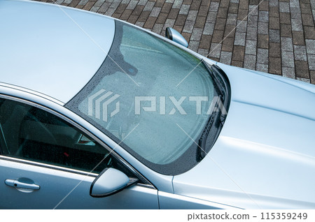 Windshield on rainy day 115359249