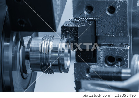 The CNC lathe machine swiss type thread cutting the metal shaft parts. The CNC lathe machine swiss type thread cutting the metal shaft parts. 115359480