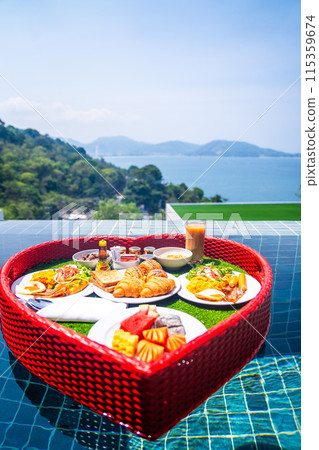 Floating brekfast in a heart shape in Patong, in Phuket, Thailand 115359674