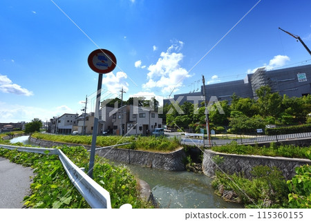 Residential area along the Daru River in Itami City Residential area along the Daru River in Itami City 115360155