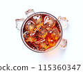 Topview cola with ice in glass on white background with ice on ground 115360347