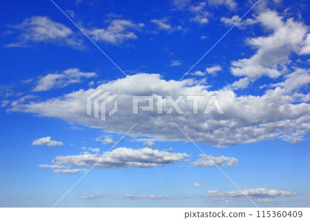 Blue sky with white clouds on a sunny day. Blue sky with white clouds on a sunny day. 115360409