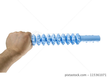 Hand holding a blue plastic roller massager 115361071