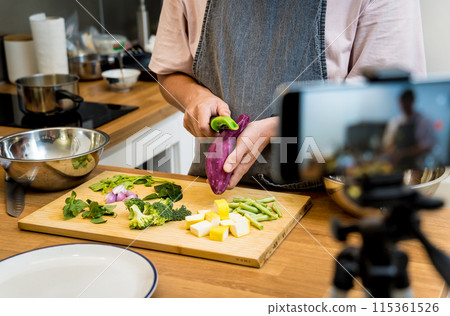 The chef is broadcasting live from workshop how to prepare a vegetarian green curry The chef is broadcasting live from workshop how to prepare a vegetarian green curry 115361526