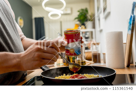 Chef at the kitchen preparing quesadillas with tofu and sweet corn 115361540