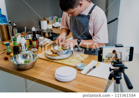 The chef is broadcasting live from workshop how to prepare a vegetarian food The chef is broadcasting live from workshop how to prepare a vegetarian food 115361584