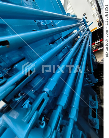Truck featuring several blue buttons on its interface for crane control Truck featuring several blue buttons on its interface for crane control 115361851
