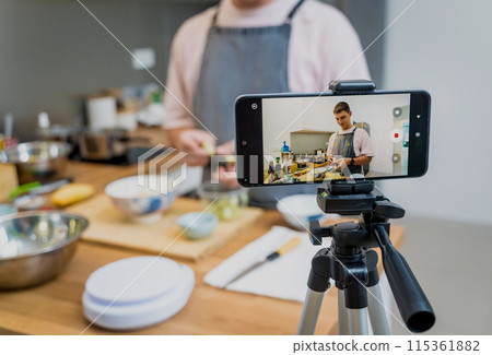 The chef is broadcasting live from workshop how to prepare a vegetarian food 115361882