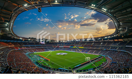 the stadium from a high vantage point. This shot would capture the grandeur and atmosphere of the event, with the pitch in the center and the crowd surrounding it 115362185