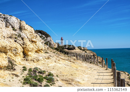 Portuguese coast in Benagil, Algarve, Portugal. Alfanzina Lighthouse. Seven Hangging Valleys Trail. Portuguese coast in Benagil, Algarve, Portugal. Alfanzina Lighthouse. Seven Hangging Valleys Trail. 115362549