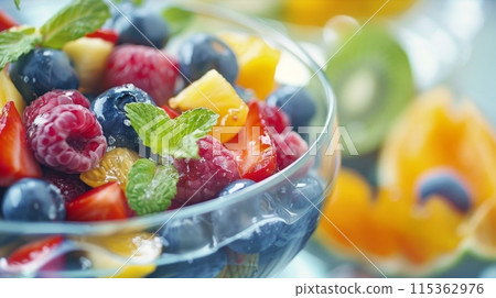 Fresh Fruit Salad Bowl with Mint Garnish 115362976