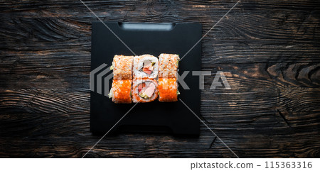 set of sushi with caviar and sesame on black tray set of sushi with caviar and sesame on black tray 115363316