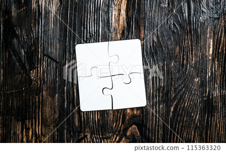 four connected pieces of jigsaw four connected pieces of jigsaw 115363320