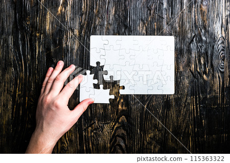 hand collecting white puzzle hand collecting white puzzle 115363322