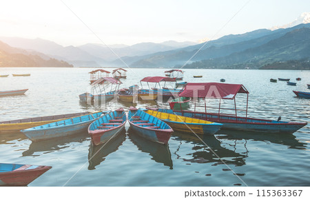Phewa lake and boats on the water, Nepal Phewa lake and boats on the water, Nepal 115363367