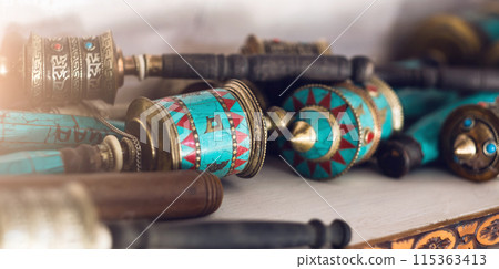 Nepalese prayer wheels at the street market Nepalese prayer wheels at the street market 115363413