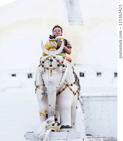 Keepers of the stairs at Boudhanath stupa, Nepal 115363423