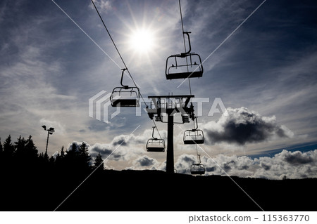 Cableway silhouette with sun and clouds on sky, Lipno nad Vltavou, Czech Republic, Europe 115363770