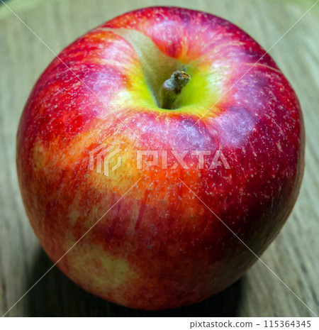 Juicy Apple Detail. Detailed view of a ripe apples moist surface. Juicy Apple Detail. Detailed view of a ripe apples moist surface. 115364345