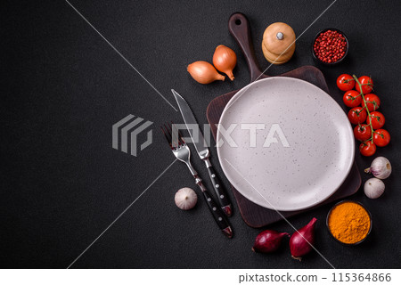 Empty ceramic round plate on dark textured concrete background Empty ceramic round plate on dark textured concrete background 115364866
