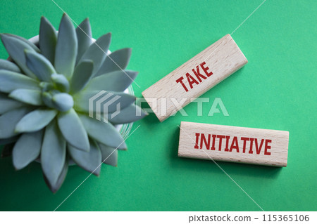 Take initiative symbol. Wooden blocks with words Take initiative. Beautiful green background with succulent plant. Business and Take initiative concept. Copy space. Take initiative symbol. Wooden blocks with words Take initiative. Beautiful green background with succulent plant. Business and Take initiative concept. Copy space. 115365106