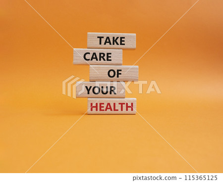 Health symbol. Wooden blocks with words Take Care of your Health. Beautiful orange background. Health concept. Copy space. Health symbol. Wooden blocks with words Take Care of your Health. Beautiful orange background. Health concept. Copy space. 115365125
