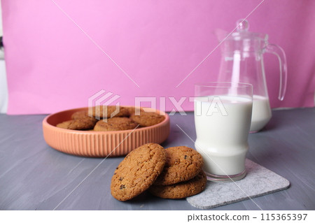 oatmeal cookies milk breakfast cookies with milkon a pink background space for text copyspace 115365397