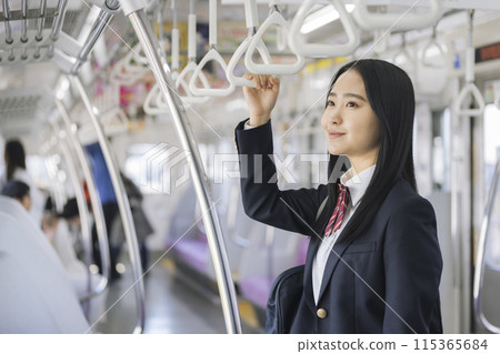 High school girl commuting to school by train High school girl commuting to school by train 115365684