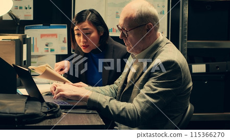 Investigators research backgrounds of suspects involved in archived old cases, looking for similarities to connect the dots. Team having forensic science expertise, uncover new case clues. Camera A. 115366270