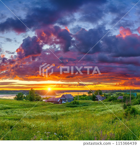 Dramatic colorful sunset in a countryside Dramatic colorful sunset in a countryside 115366439