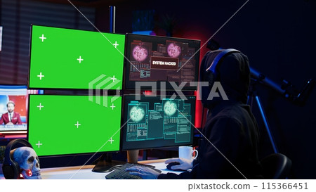 Happy man writing code on green screen PC, celebrating after managing to get past security systems. Joyous hacker feeling proud after breaching firewall using mockup computer, camera B 115366451