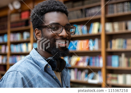 Portrait of a smiling young dark-skinned man Portrait of a smiling young dark-skinned man 115367258