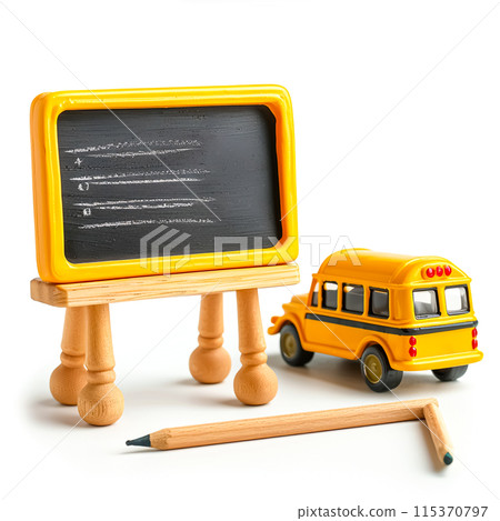Playful Yellow School Bus Toy and Chalkboard with Chalk on White Background for Education and Fun Playtime Concept 115370797