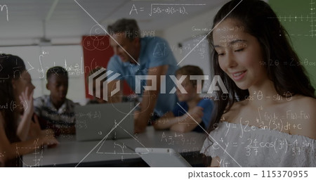 Image of mathematical equations over school children using laptop and smartphone in classroom Image of mathematical equations over school children using laptop and smartphone in classroom 115370955