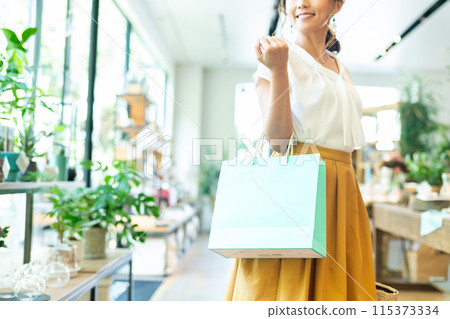 A young woman shopping A young woman shopping 115373334