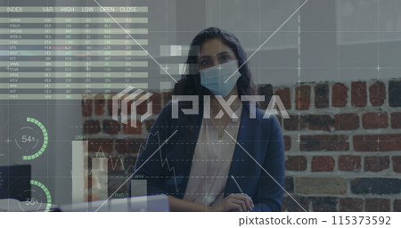 Image of financial data processing over businesswoman wearing face mask 115373592