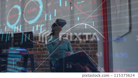 Image of financial data processing over businesswoman wearing vr headset in office Image of financial data processing over businesswoman wearing vr headset in office 115373624