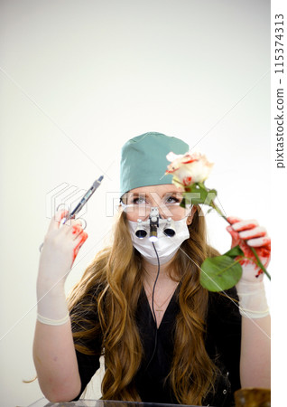 learn to give an injection of anesthesia white rose blood Female scientist hands with syringe injecting rose 115374313